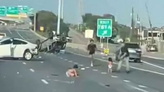 Texas: Two toddlers filmed walking around after car crash on US highway