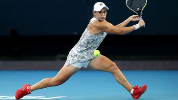 Ashleigh Barty of Australia plays a backhand in her fourth round singles match against Amanda Anisimova of United States.