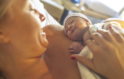 Mother with newborn baby in hospital