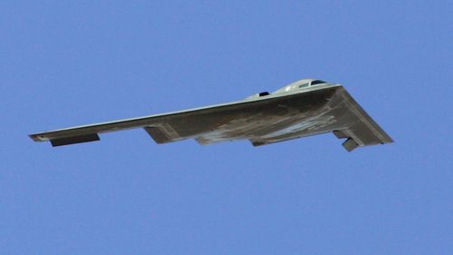  A B-2 Spirit flies by during a U.S. Air Force firepower demonstration at the Nevada Test and Training Range September 14, 2007 near Indian Springs, Nevada. (Getty)