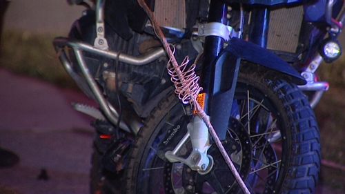 The bike crashed into a bollard, but luckily the rider was uninjured. (9NEWS)