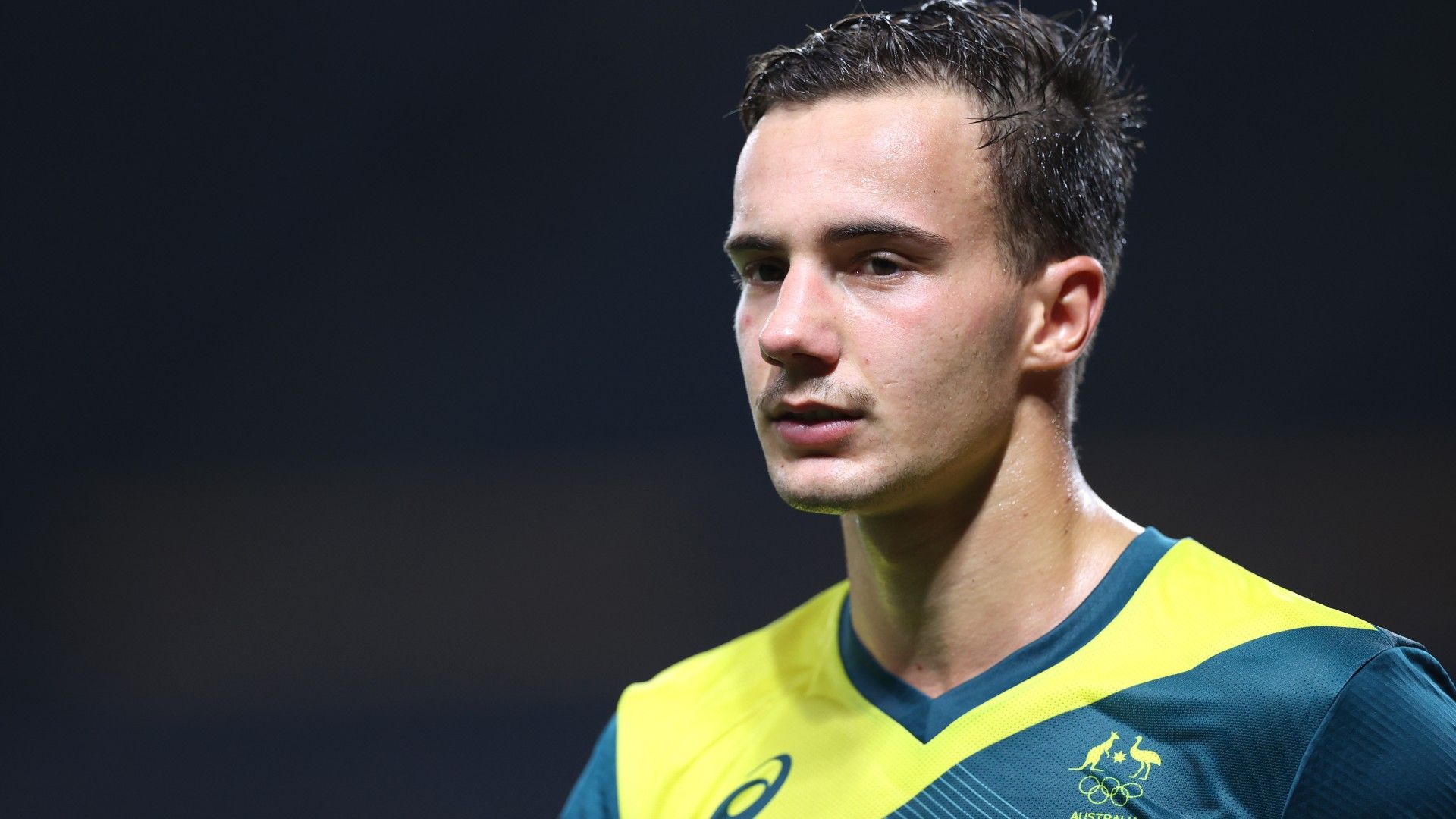 Socceroos midfielder Denis Genreau says he'll be up to the pressure of crunch qualifying match