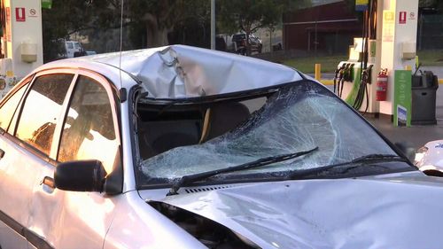 The vehicle that hit the woman received significant damage. Image: 9News
