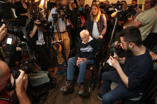 The centenarian told a crowded news conference that he's ready to go.