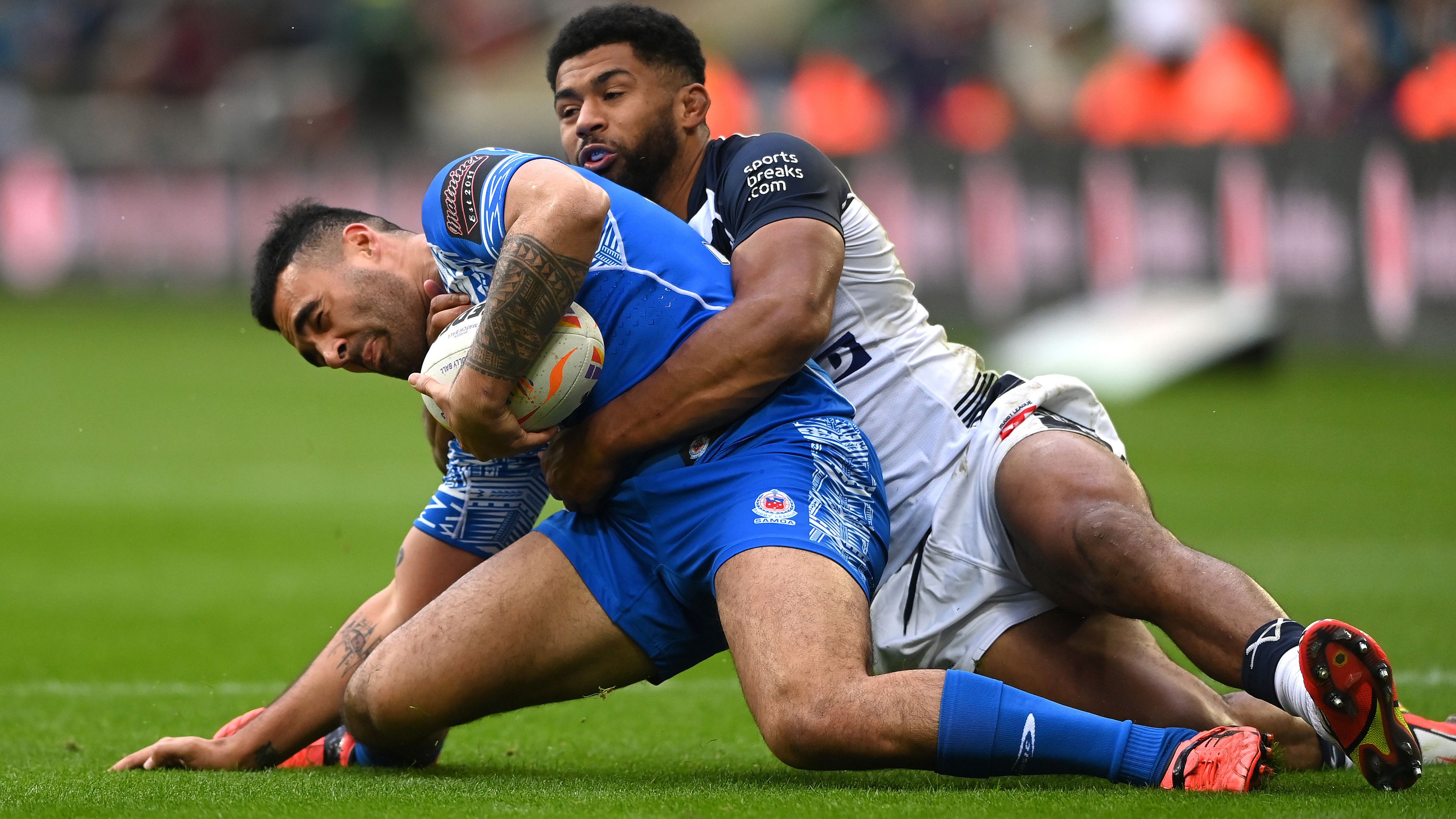 Samoa player Tyrone May is injured in a tackle by Kallum Watkins of England before being stretchered off during Rugby League World Cup 2021 Pool A match between England and Samoa at St. James Park on October 15, 2022 in Newcastle upon Tyne, England. (Photo by Stu Forster/Getty Images)