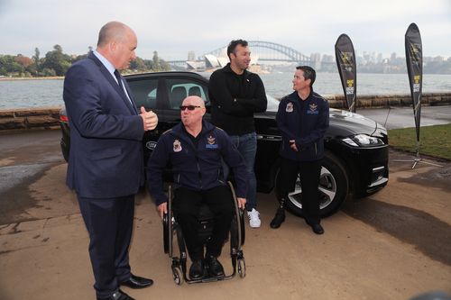 Mr Elliot met 2017 Invictus wheelchair basketball champion Jeff Wright. Picture: AAP