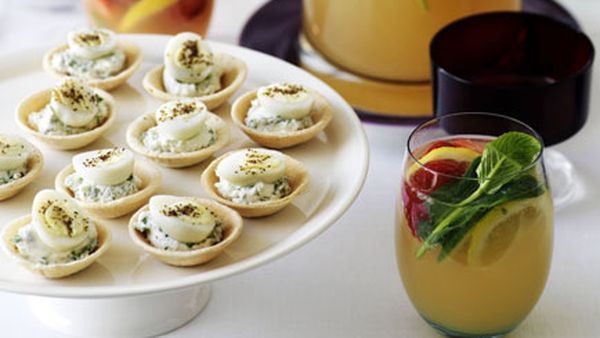 Goat’s curd and quail egg tartlets