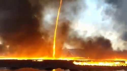 This rare phenomenon is known as a “firenado” and happens when cool air hits the top of the hot air, causing it to swirl. Picture: Supplied