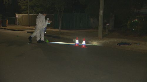 A man is fighting for life in hospital after being found lying in the street with serious head injuries in Adelaide.