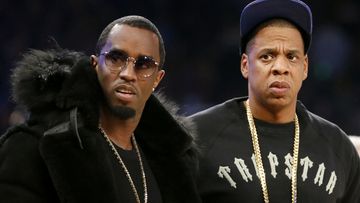 FILE - Rap moguls Sean &quot;Diddy&quot; Combs, left, and Jay-Z attend the NBA All-Star basketball game, Feb. 15, 2015, in New York. (AP Photo/Kathy Willens, File)