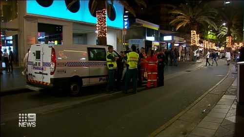 Two senior police constables have spent the night in hospital after being attacked during a wild brawl outside a Gold Coast nightclub.
