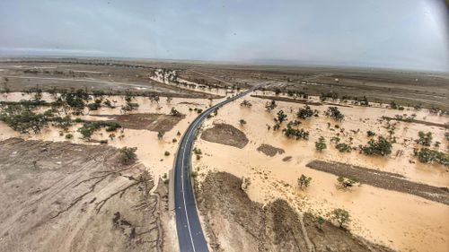 Ms Sloan said it was "unreal" to watch so much water pour into the parched outback.