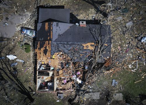 A house is destroyed from a tornado in  Covington, Tenn., Saturday, April 1, 2023. 