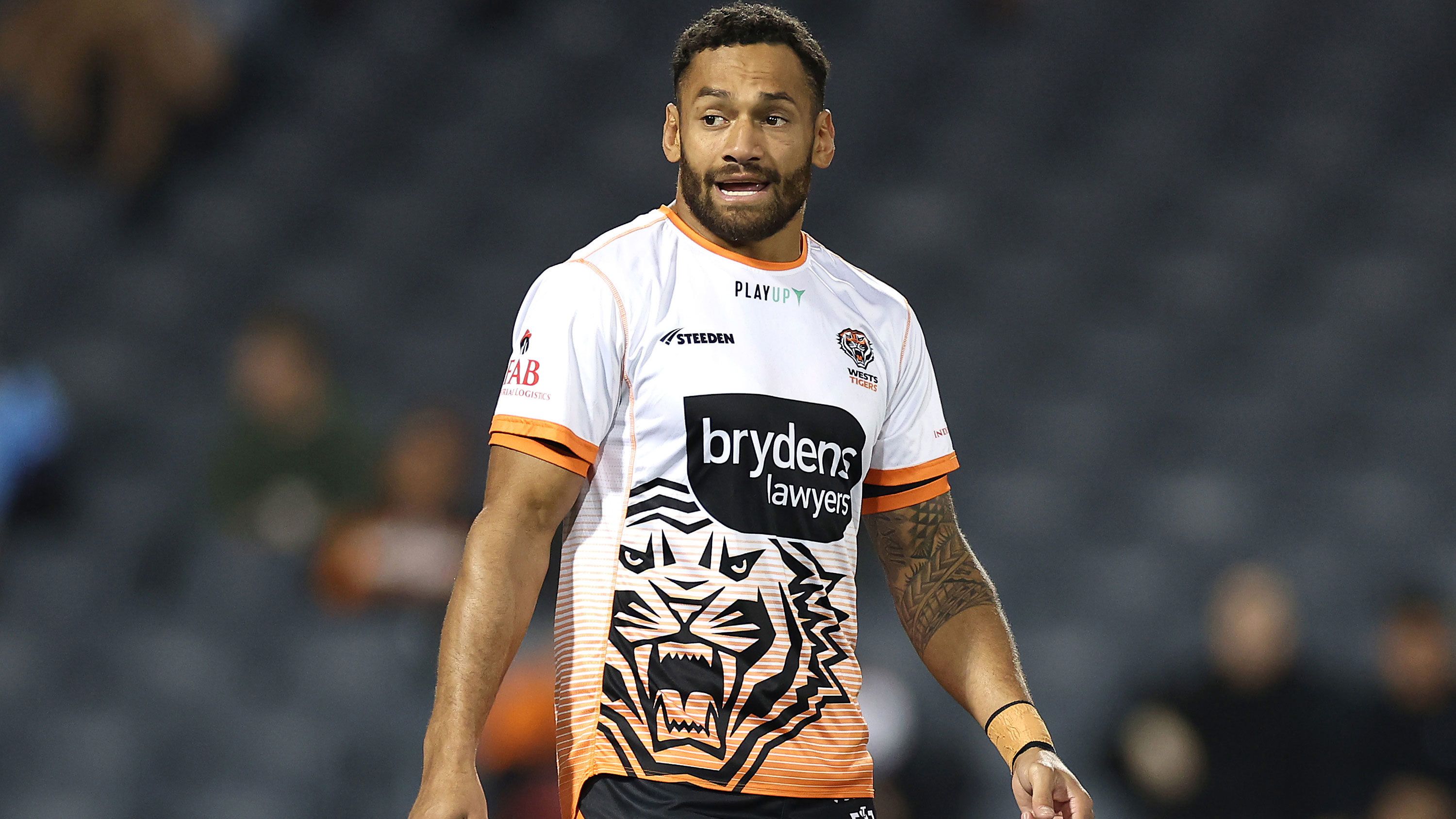 Apisai Koroisau of the Wests Tigers warms up before the round 14 NRL match against Canberra Raiders.