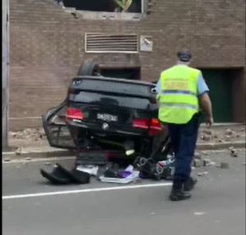 Sydney news Eastwood car crash shopping centre BMW flip