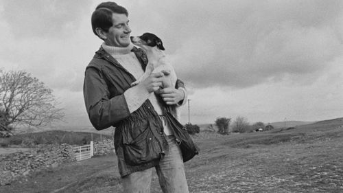 Model Norman Scott (pictured) was taken to a remote rural shot but was spared his life when the gun jammed but his dog was not as lucky. He claims it was a botched attempted murder (Getty)