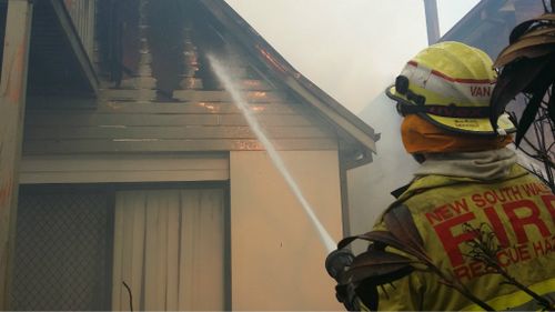 Firefighters battling a blaze at a home in Katoomba.