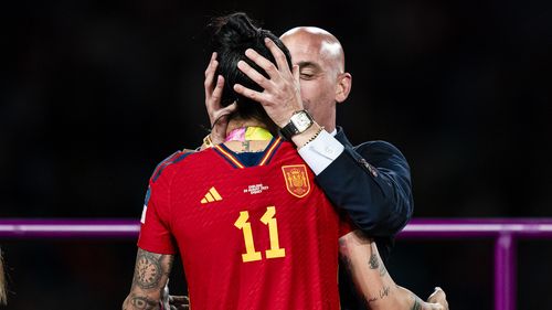 Luis Rubiales kisses Jennifer Hermoso during the medal ceremony.