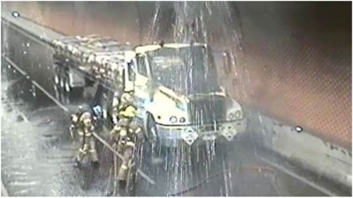MFB crews work to clear the tunnel.