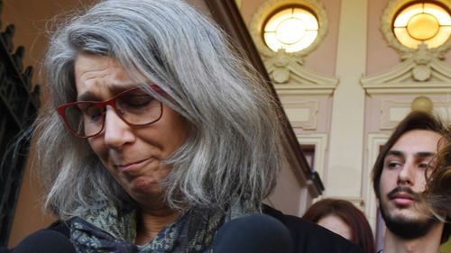 Hannah Quinn's mother crying outside court after her daughter was granted bail.