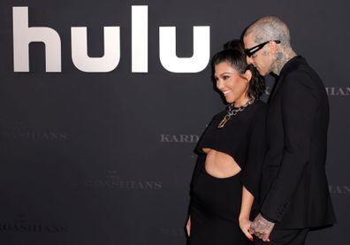 Kourtney Kardashian and Travis Barker attend the Los Angeles premiere of Hulu's new show "The Kardashians"