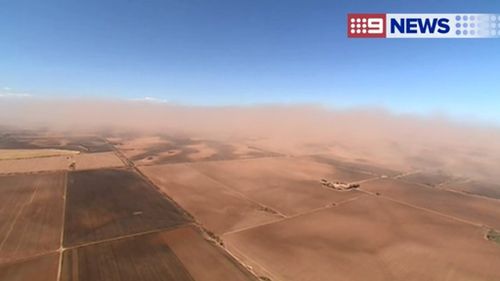 Motorists urged to take extreme care as large dust storm sweeps area north of Adelaide