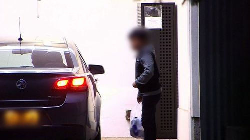 The child arrives at Grafton police station to be reunited with his family. Picture: 9NEWS