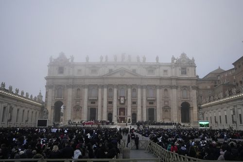 The fog covers the St. Peter's Basilica Dome in St. Peter's Square at the Vatican ahead of the funeral mass for late Pope Emeritus Benedict XVI, Thursday, Jan. 5, 2023. Benedict died at 95 on Dec. 31 in the monastery on the Vatican grounds where he had spent nearly all of his decade in retirement, his days mainly devoted to prayer and reflection. (AP Photo/Alessandra Tarantino)