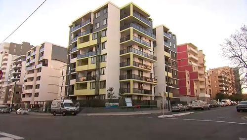 The gunman and his accomplice were buzzed into the building at about 5.30pm on Sunday. Picture: 9NEWS