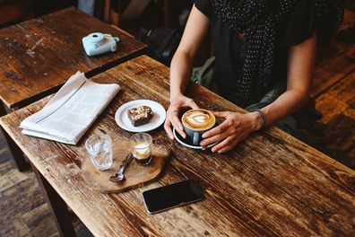 Woman having coffee 