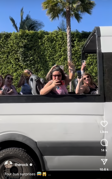 The Rock surprises fans on a tour bus