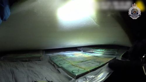 The money was allegedly found between the mattress of a bed on the property