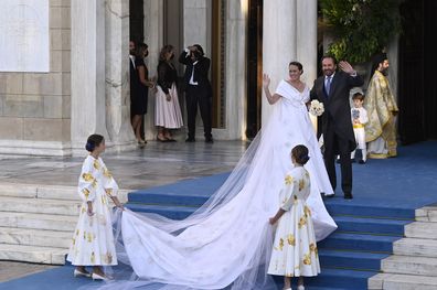 Nina Flohr and Thomas Flohr arrive at the Metropolis Greek Orthodox Cathedral on October 23, 2021 in Athens, Greece. (Photo by Milos Bicanski/Getty Images)