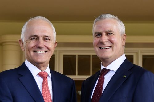 Newly elected Nationals party leader Michael McCormack is congratulated by Prime Minister Malcolm Turnbull after being sworn in as Australia's Deputy Prime Minister during a ceremony in Canberra. Picture: AAP