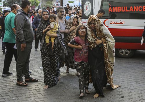 Injured Palestinians arrive to al-Shifa Hospital