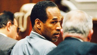 O.J. Simpson confers with his lawyer F. Lee Bailey during a pre-trial hearing January 12, 1995. 