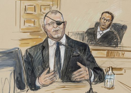 This artist sketch depicts the trial of Oath Keepers leader Stewart Rhodes, left, as he testifies before US District Judge Amit Mehta on charges of seditious conspiracy in the January 6, 2021 attack on the US Capitol. 2022.