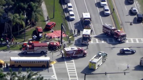 Emergency service crews converge on the school to assist with the fallout from the shooting. (Supplied)