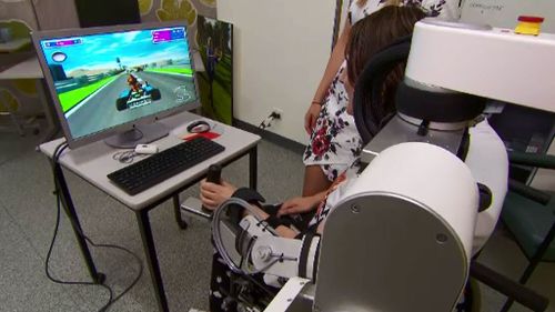 The machine measures how much effort a patient is putting in while supporting the limb. (9NEWS)