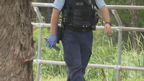 Officers found a large knife in bushland close to where the three were arrested.