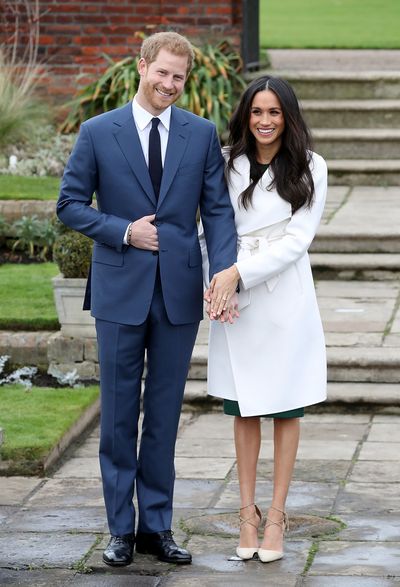 Meghan Markle and Prince Harry during an official photo call to announce their engagement at The Sunken Gardens at Kensington Palace on November 27, 2017