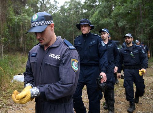 Detectives of police have trucked in for the search in Kendall. Picture: AAP