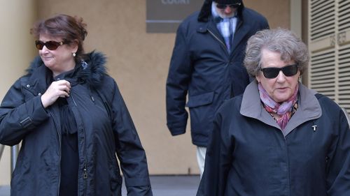 Michael Russell's wife Polly and her mother outside court. (AAP)