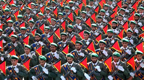 Iran's Revolutionary Guard troops march in a military parade in Tehran.