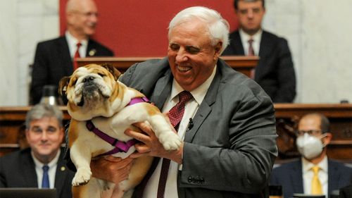 Governor Jim Justice and his dog Babydog.