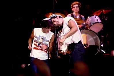 Bruce Springsteen and Courteney Cox at the filming of the video for Dancing in the Dark on 6/27/84 in Minneapolis, Mn.  (Photo by Paul Natkin/WireImage)