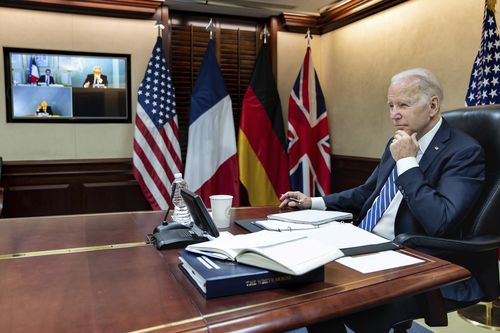 President Joe Biden listens during a secure video call with French President Emmanuel Macron, German Chancellor Olaf Scholz and British Prime Minister Boris Johnson in the Situation Room at the White House Monday, March 7, 2022, in Washington. 