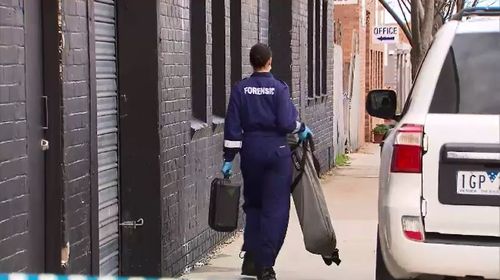 Forensics officers, homicide police and the SES remain on the scene as they investigate the remains. Picture: 9NEWS.