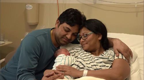 The newborn baby of Victorian woman Mahima Atwar and her husband Asis was delivered by the side of a road after she went into labour earlier than expected.