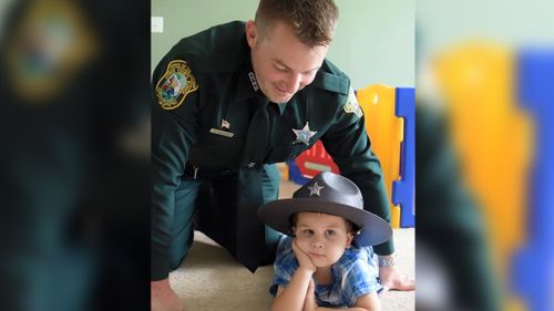 Citrus County Sheriff's Officer shared a photo of Deputy Doncourt and his son. (Facebook)